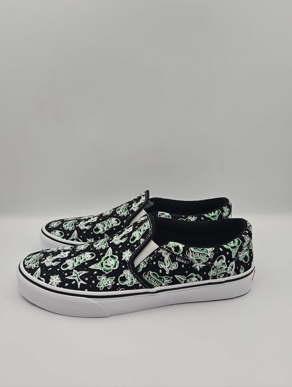 Vans Slip-On Sneakers with Green Graphic Print